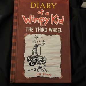 Diary of a Wimpy kid the third wheel book 7 by Jeff Kinney
